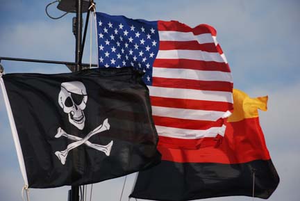 Flags on pilothouse of tug Altman