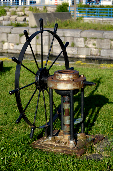 old ship's wheel in park